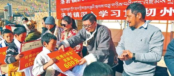 企地携手 为贫困学子送去希望